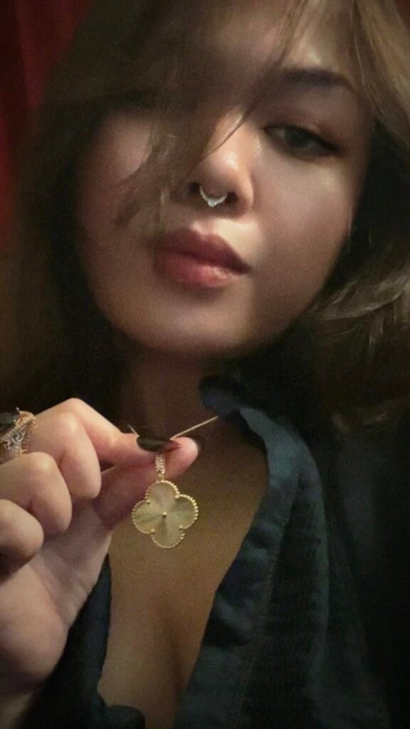 Findom Goddess Lacia Lucis seductive and dominant look